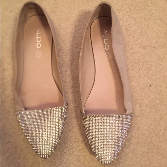 Rhinestone Flat in an iridescent silver color.