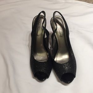 Shimmering black Sling-back heels. Size 8.5