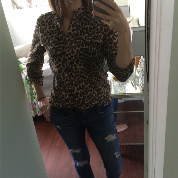 Cheetah print button down blouse.