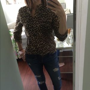 Cheetah print button down blouse.