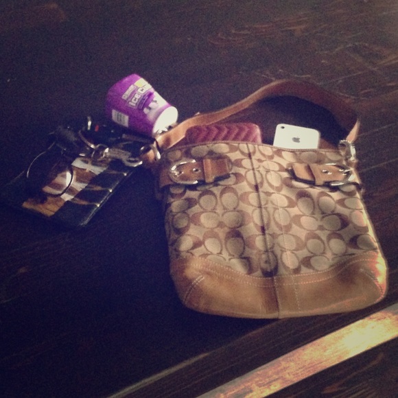 A tan brown coach bag!