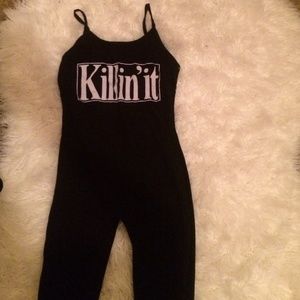 Black jumpsuit with spaghetti straps.