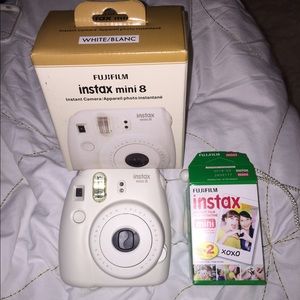 White Fujifilm Instax mini 8 camera