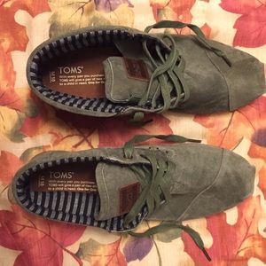 Army green toms with the inside black and white
