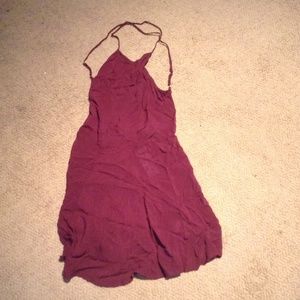 Maroon low back dress.