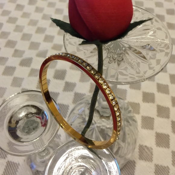 Gold tone diamond Rhinestone Bangle by Avon