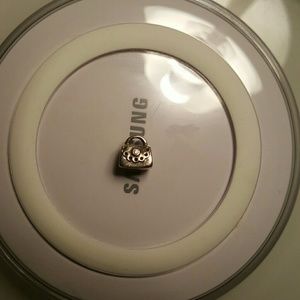 Pandora purse with pink CZ charm