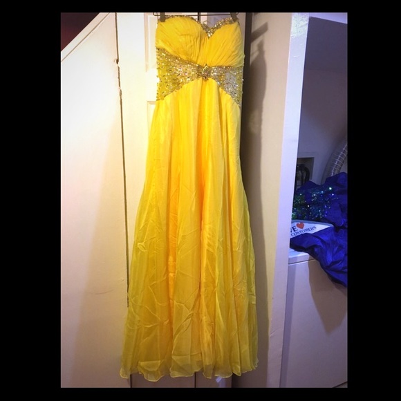 Yellow strapless gown with beautiful back