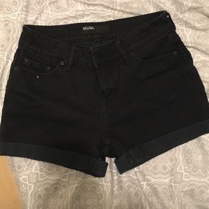 Black denim shorts