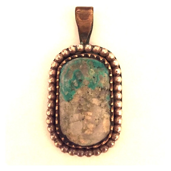 Turquoise, copper, and silver pendant
