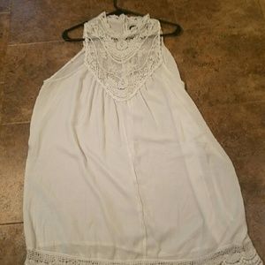 White dress with crochet neckline.