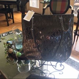 Brand New, Never Used Michael Kohrs Chrome Bag
