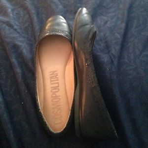 black cosmopolitan flats