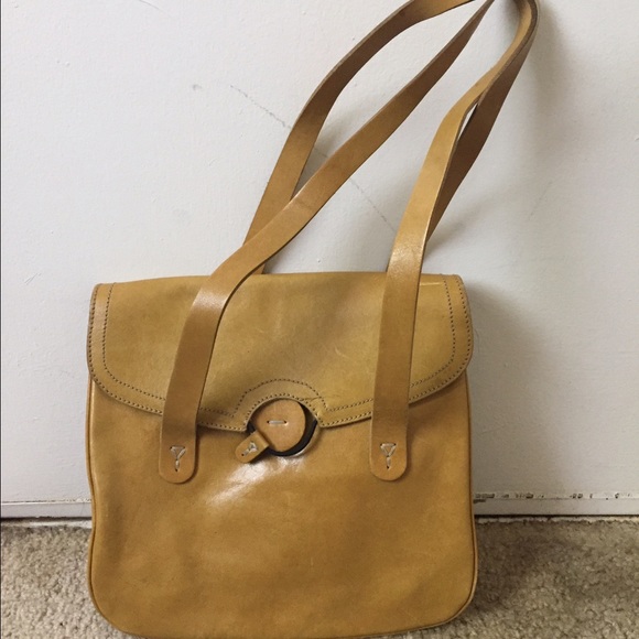Mustard-colored leather bag from Christopher Kon