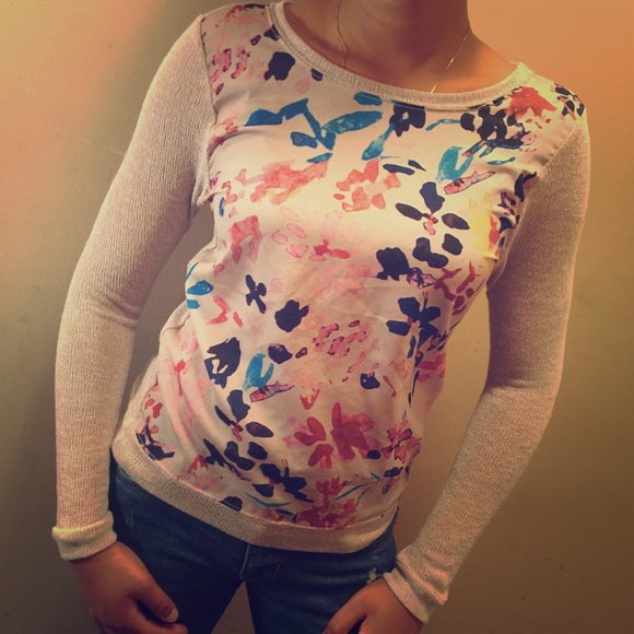 Light weight sweater with sheer front.