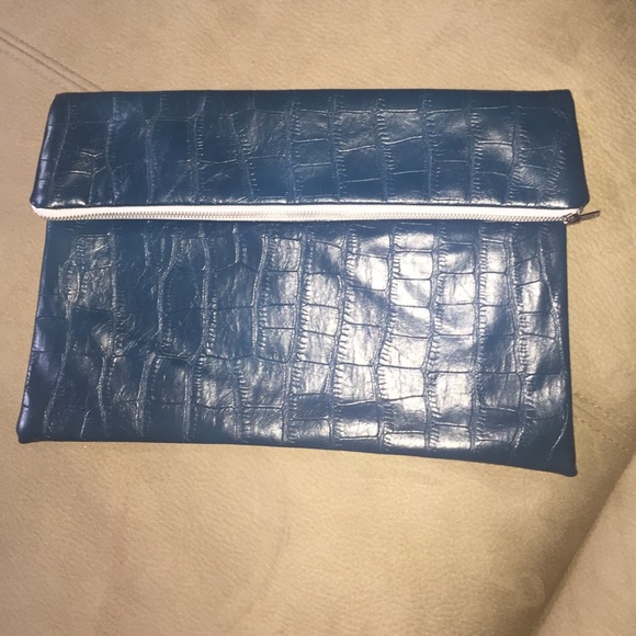 Fold over crocodile print clutch