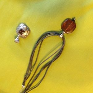 Silpada. Black leather necklace with two charms