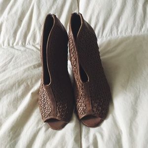 Woven booties with opening down the front.