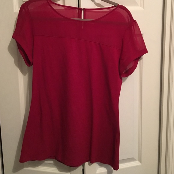 Express top with mesh detail. Never worn