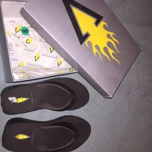 Volatile brown flip flops