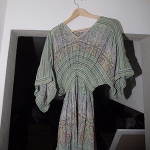 Grey slip dress and green slip dress