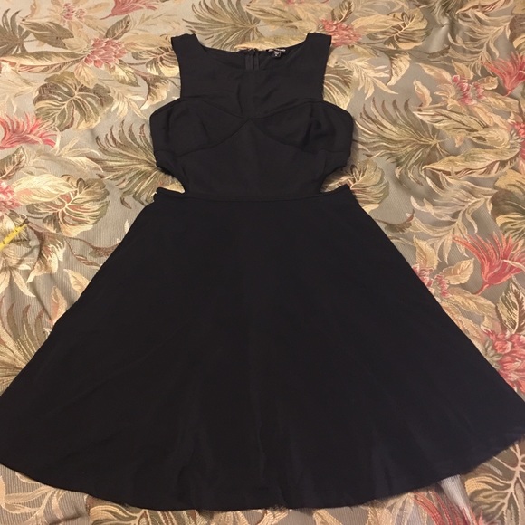 Bebe medium black dress. Cut out sides. - Picture 1 of 4