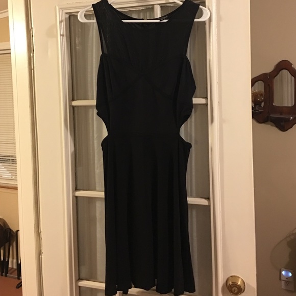 Bebe medium black dress. Cut out sides. - Picture 4 of 4