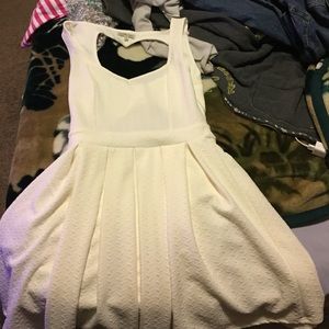 White skater dress with heart cutout back