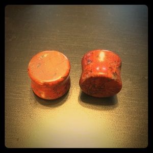 Size 5/8" red turquoise plugs. Never been worn.