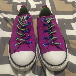 Purple and lime green converse