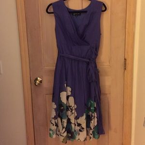 Beautiful purple wrap dress with floral accents