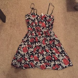 Little black dress with rose embellishments