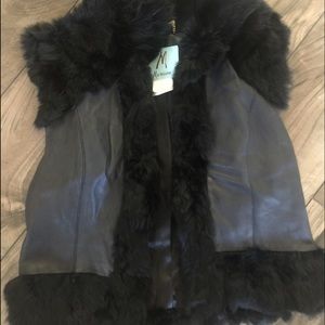 Fur and leather vest