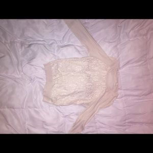 Laced cream sweater.