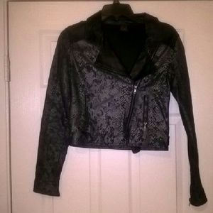 Faux leather jacket shows signs of wear