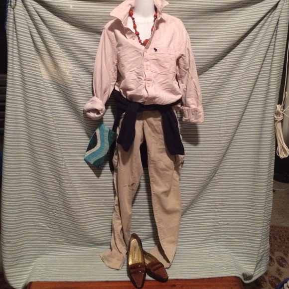 Shoes necklace pants sweater Oxford clutch