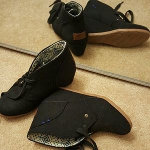 Black wedge heel booties