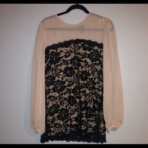Black lace and nude blouse