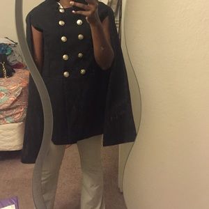 All black cape with gold button