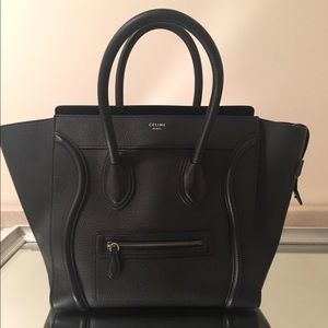 Celine micro luggage in black pebbled leather.