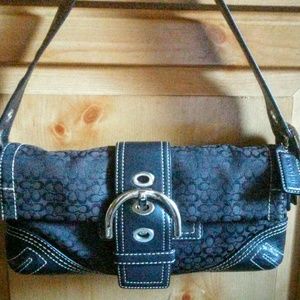 Coach No. C05Q-3628 Signature Soho flap purse