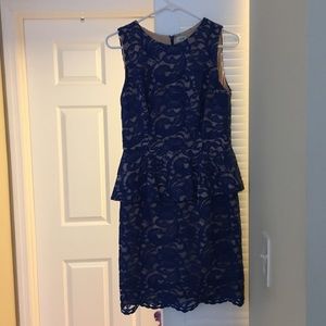 Peplum cache blue and nude lace dress.