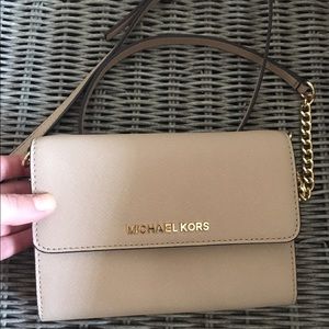 Michael Kors wallet on a chain crossbody