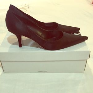 Black satin pumps