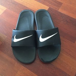 Nike black slides white swoosh