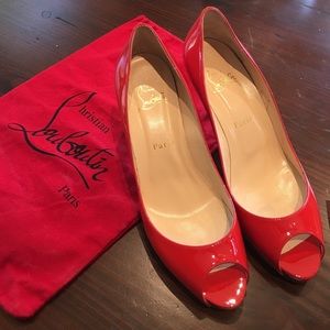 Christian Louboutin red peep toe pumps
