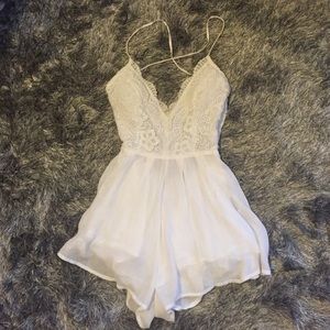 White lace romper with open back
