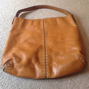 Worn studded Michael Kors bag