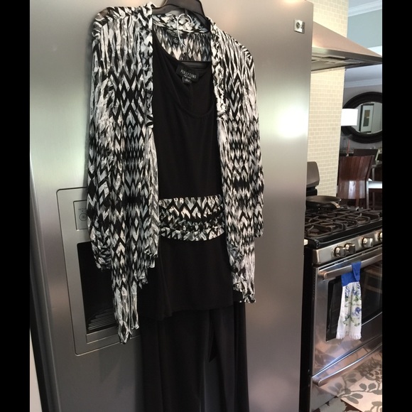 Three piece dressy pantsuit.