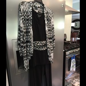 Three piece dressy pantsuit.